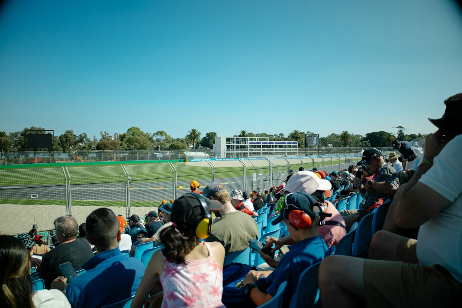 Spectators watch a race from the stands.
